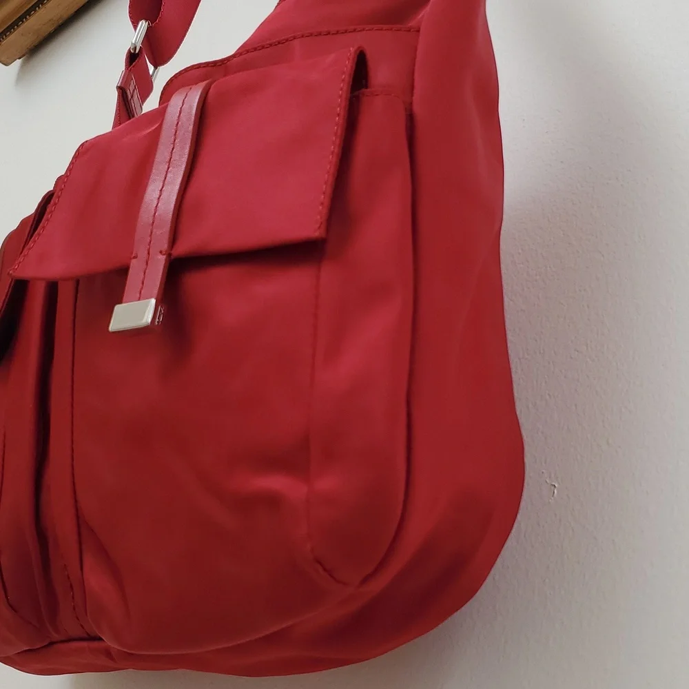 Tumi Pucket E/W Flap Crossbody Messenger Bag in Red with Silver Hardware
